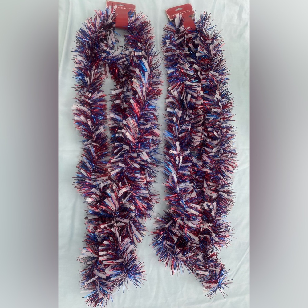 Two sets of 12’ red/white/blue garland